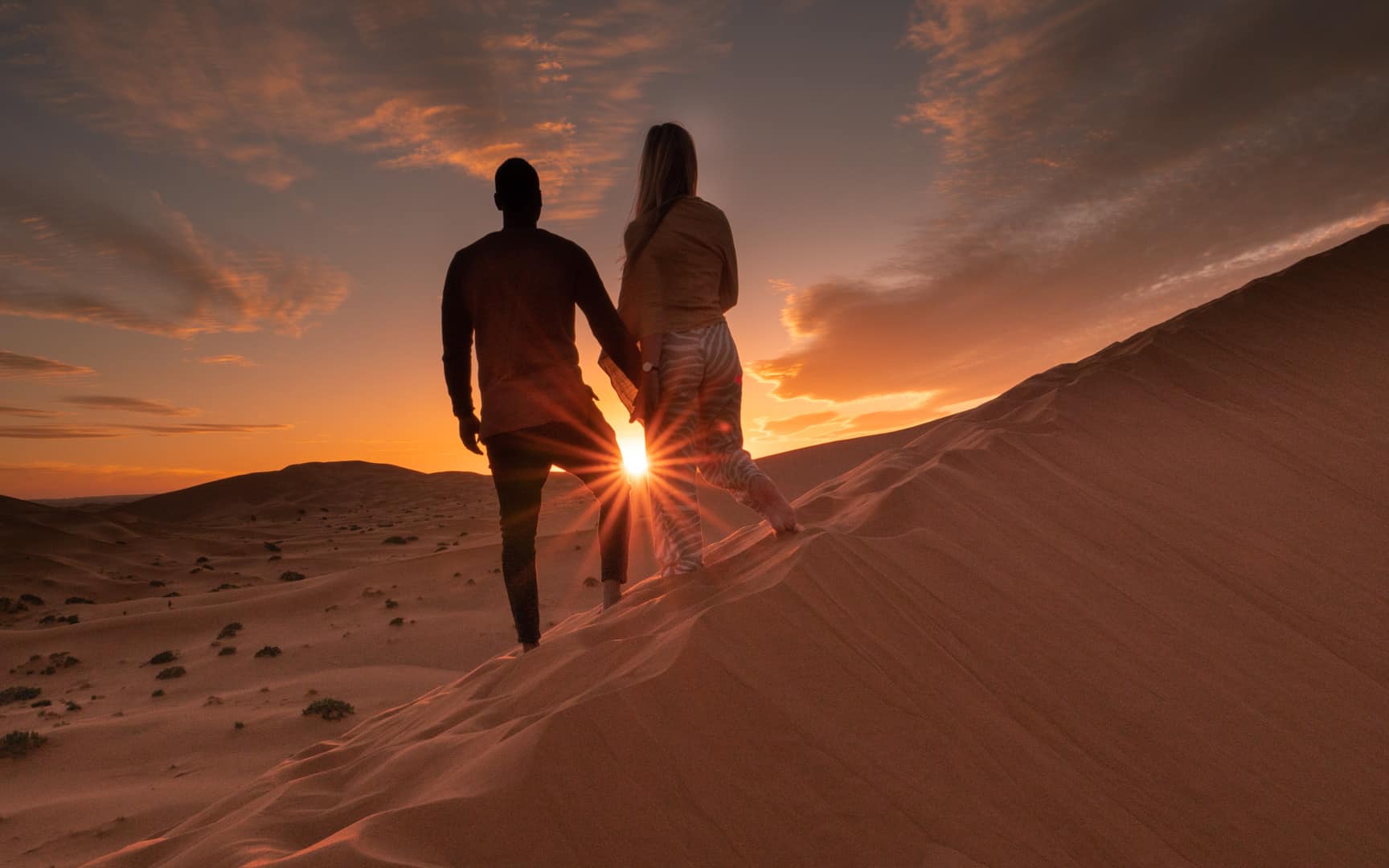 Morocco-desert-review-sunset-couple