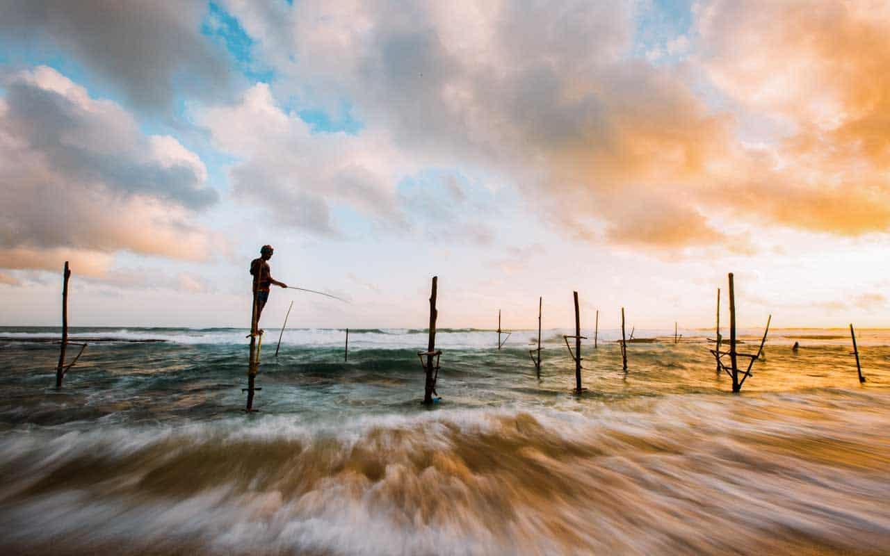 stilt-fisherman-beach-sri-lanka